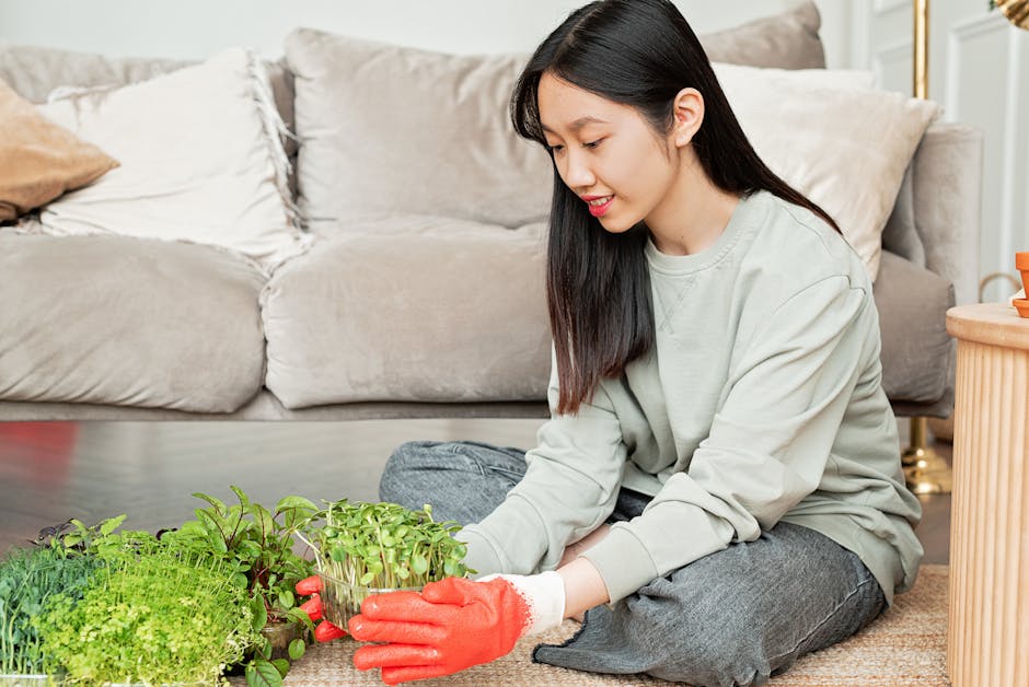 Happy family enjoying comfortable indoor air quality in living room with modern humidifier and healthy green plants creating optimal humid environment for overall eye and respiratory comfort